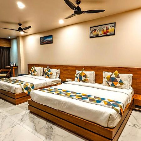 The Sky Imperial Unity Inn Garudeshwar Bagian luar foto
